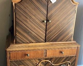 Antique Chest of Drawers with Ornate Carved Accents