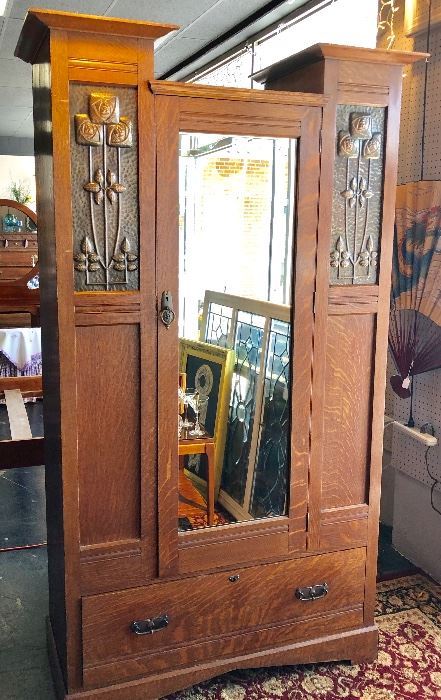 EXQUISITE, Antique English Armoire with hammered tin pieces on each side of the mirrored door, and one bottom drawer. 