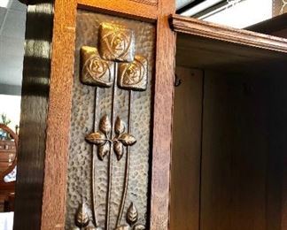 Closer look of the hammered tin front pieces of the English Armoire