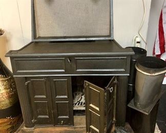 Antique FRANKLIN WOOD BURNING STOVE, with metal pipes, screen, and base