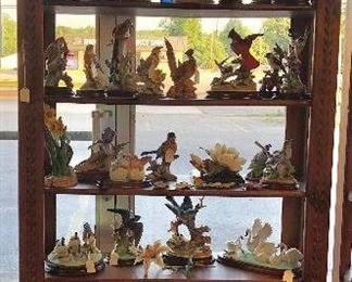 A collection of porcelain bird figurines by Andrea, Napoleon Capodimonte and other famous artisans