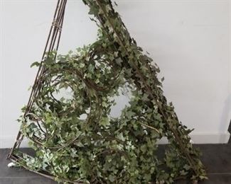 the top of a three sided iron gazebo