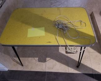 darling little formica top tables, ( this one has an outlet)