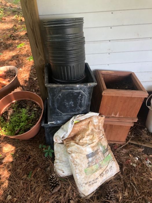 Tons of empty pots and gardening items