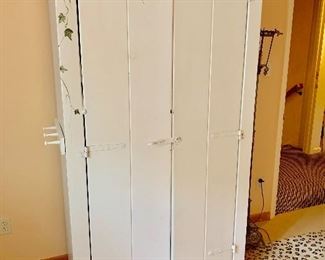 Painted rustic cabinet with Ivy trim