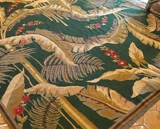 Needlepoint Area rug in jungle motif.