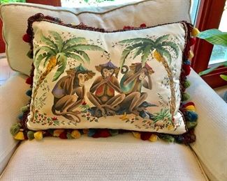 Monkey motif pillow with tassel trim