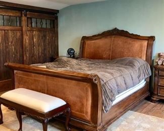 California King bedroom set with leather accented head & foot board