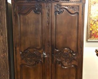 Armoire with carved angels