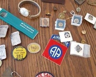 Variety of pins and badges from Ford Motor Company and others