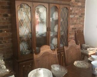 stately China Cabinet would look great in your home and holds many pieces with bottom storage too
