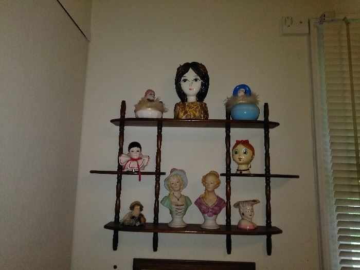 wall shelf and vintage figurines