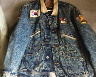 Women’s Denim jacket w/ several patches from around the world.