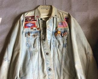 Vintage faded men’s jacket w/ patches & pins from a traveled past.