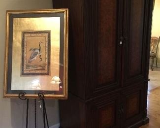 Great easel and heron print.  Large armoire for TV and storage.