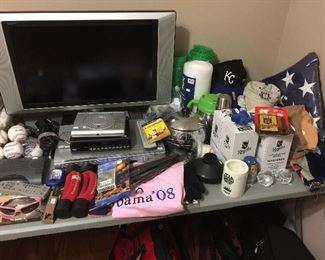 Tons of KC Royals items, flat screen TV, VCR.