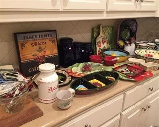 Kitchen full of festive serving pieces.