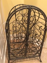 Metal wine rack. Can also go on counter.
