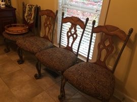 Four matching metal/wood dining chairs.