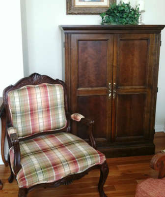upholstered chair and storage cabinet