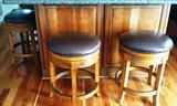 four padded barstools