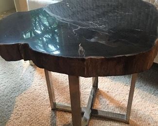 Mid century table made of petrified wood 