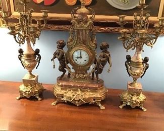 French style two color bronze and marble three piece clock garniture set, table still life, oil on canvas