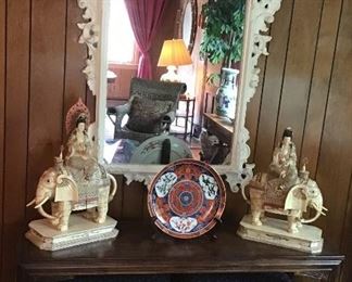 Pair of large Chinese bone figures of Quan Yin seated on an elephant, carved mirror, console, pair of x benches