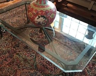 Glass top iron base cocktail table, large Chinese vase, Karastan carpet 8’8”x12’