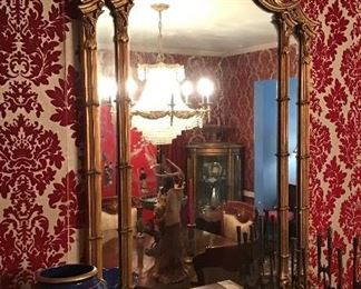 Federal style gilt mirror with phoenix crest, Murano vase