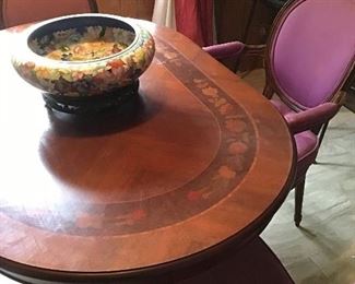 Oval floral inlaid dining table