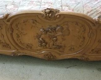 Close up of carvings on bed