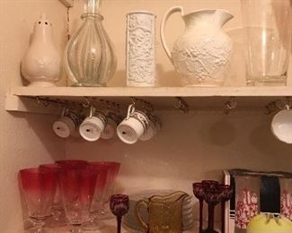 As you can see, we have some very nice glass and china. These are some very unusual pieces. 