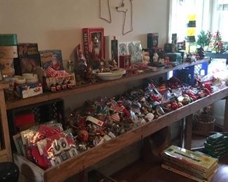 These tables are 8 feet long and 2 feet wide. This one is filled with just Christmas tree ornaments 