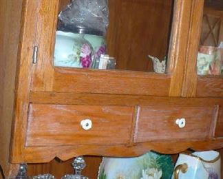 THIS CABINET PACKED FULL WITH HAND PAINTED DISHES, CRYSTAL AND DEPRESSION