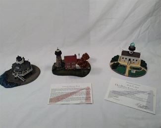 lot of 3 porcelain Danbury Mint Lighthouses . Charlotte Genesee light, Hooper Strait light , and Old Point            https://ctbids.com/#!/description/share/152071