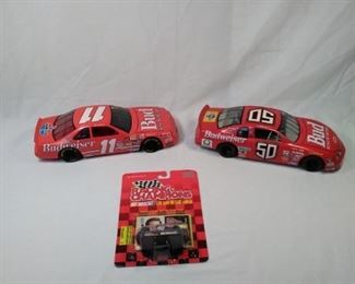 lot of three Nascar / Budweiser collectible cars. including Robby Gordon https://ctbids.com/#!/description/share/152077