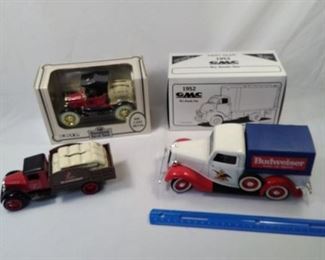 lot of 4 Diecast coin banks including a GMC, Budweiser and Anheuser-Busch   https://ctbids.com/#!/description/share/152076