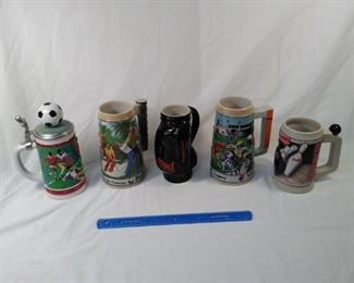 lot of 5 Budweiser and Worldcup collector steins . including golf, basketball, and bowling    https://ctbids.com/#!/description/share/152099