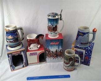 lot of 5 Budweiser collector steins. including Olympics https://ctbids.com/#!/description/share/152096