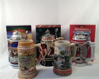 lot of 5 beer steins. including Budweiser , Kentucky , and Busch Gardens https://ctbids.com/#!/description/share/152107