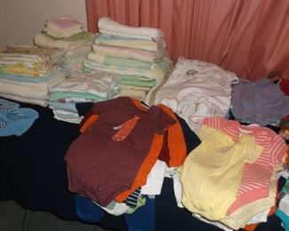 Lots of like new baby clothes