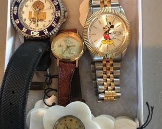 Collection of Watches
-Men’s LSU Watch
- Men’s Mickey Mouse Watch
- Woman’s LSU Watch
- Sweet YLQ Watch