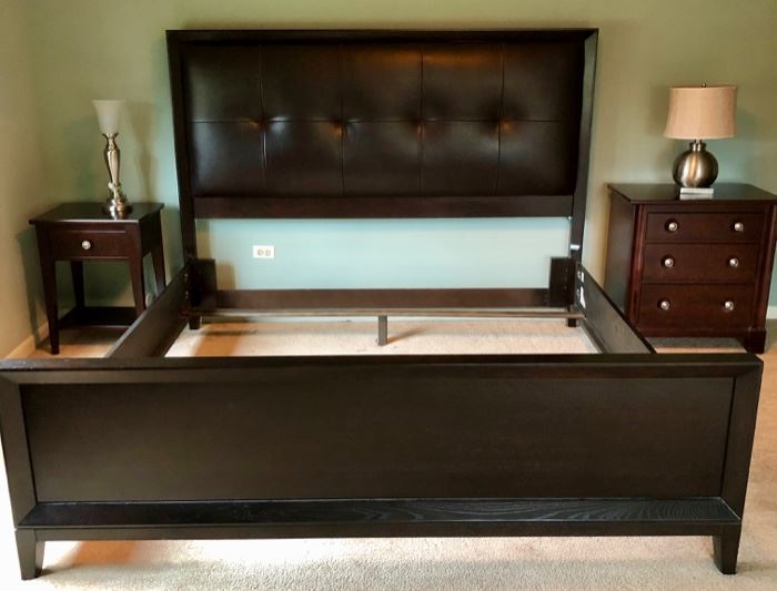 This appears to be a padded headboard, two side tables, and a bed frame