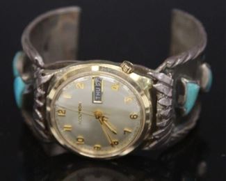 LOT #5596 - BULOVA MAN'S WRISTWATCH ON NAVAJO BRACELET