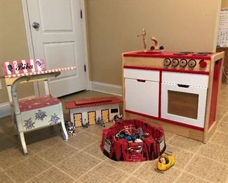School desk, stables and horses, play stove, toys!