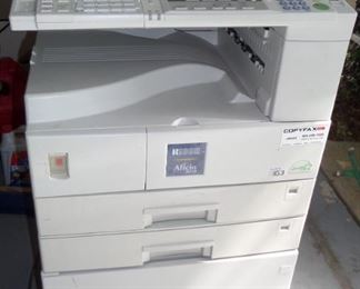 Ricoh 2018 copier on cabinet