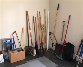 Lots of yard tools, weather station, pogo stick 