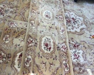 Large selection of ornate rugs througout