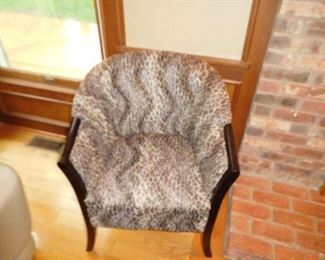 one  of  two  leopard  chairs